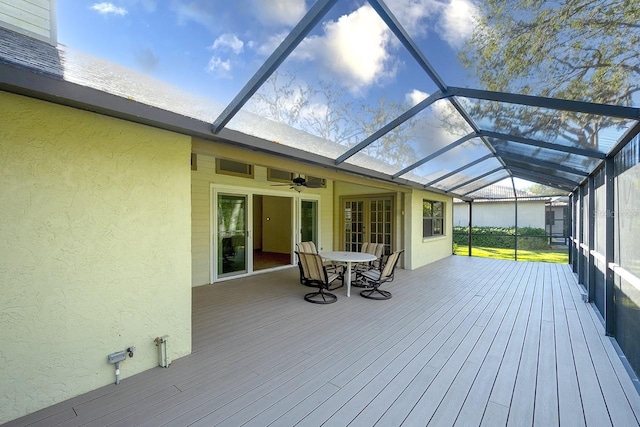 wooden deck with a lanai