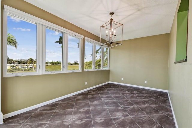 empty room with a chandelier