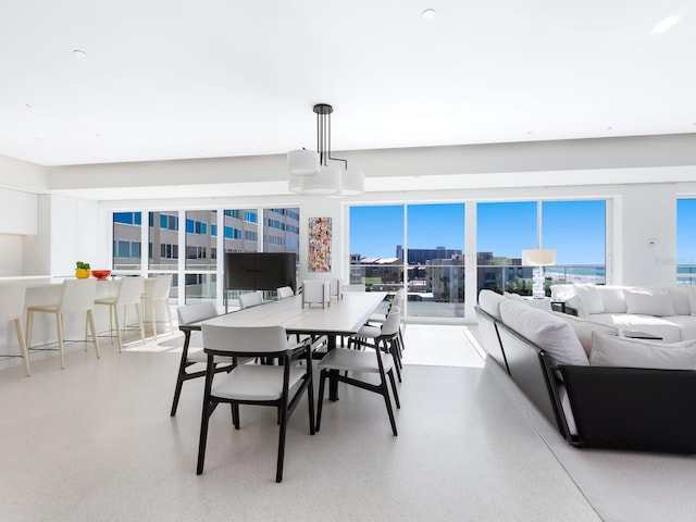 dining area with speckled floor