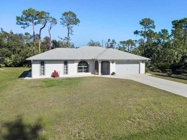 ranch-style house with a garage and a front lawn