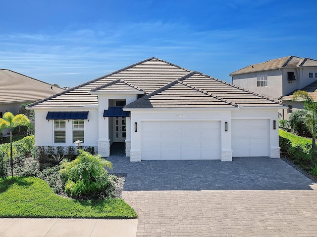 view of front of home with a garage