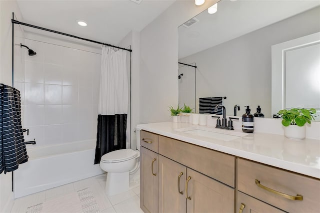 full bath featuring visible vents, toilet, shower / bath combo with shower curtain, vanity, and tile patterned flooring