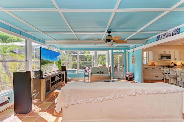 interior space featuring ceiling fan