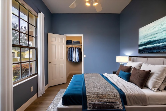 bedroom featuring a closet, hardwood / wood-style flooring, and ceiling fan