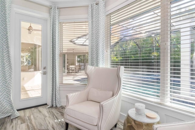 sitting room featuring light hardwood / wood-style floors