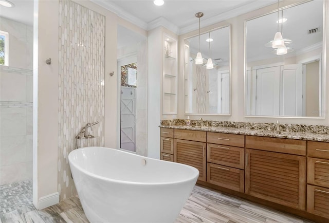 bathroom with vanity, independent shower and bath, and ornamental molding