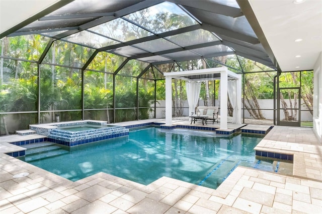 view of swimming pool featuring a patio area, an in ground hot tub, and glass enclosure