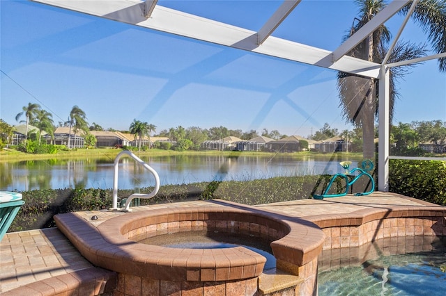 view of patio with a water view