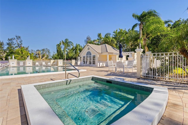 view of pool featuring a patio