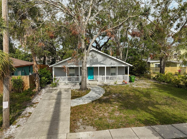 bungalow-style home with a front lawn