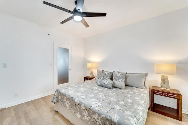 bedroom featuring ceiling fan and light wood-type flooring