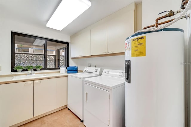 laundry room featuring cabinets, independent washer and dryer, electric water heater, and sink