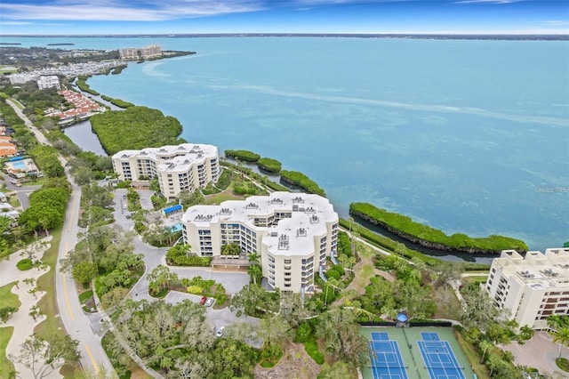 birds eye view of property featuring a water view