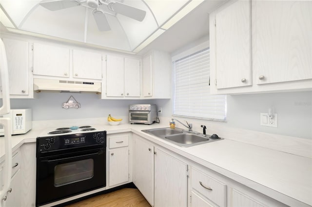 kitchen featuring white cabinets, ceiling fan, sink, and black range with electric cooktop