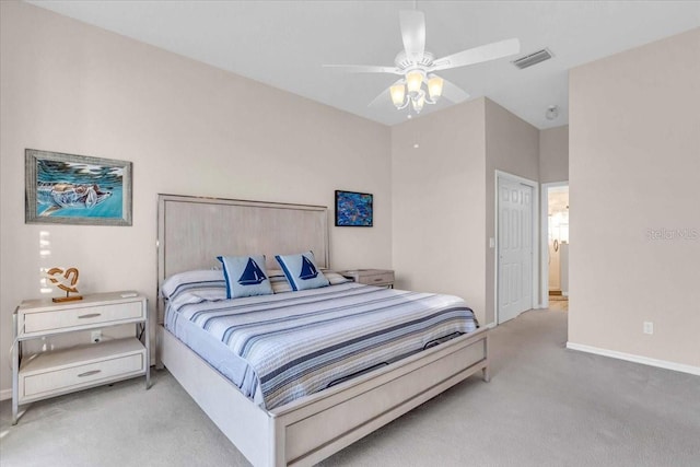 bedroom with light colored carpet and ceiling fan