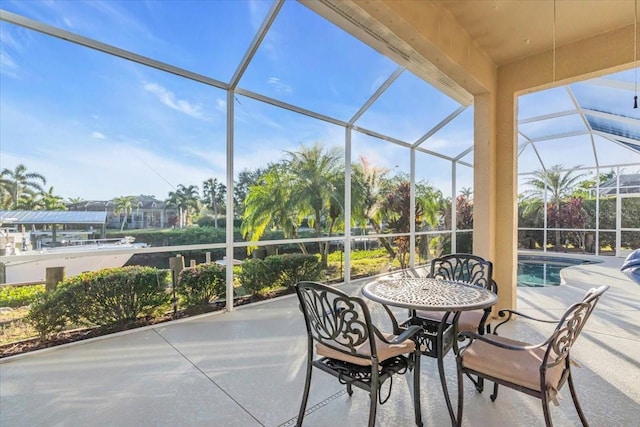 sunroom featuring a pool