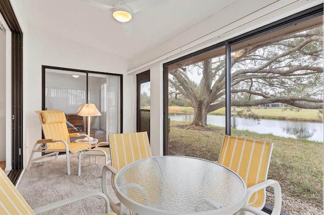 sunroom with a water view