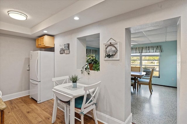 dining room featuring light hardwood / wood-style floors