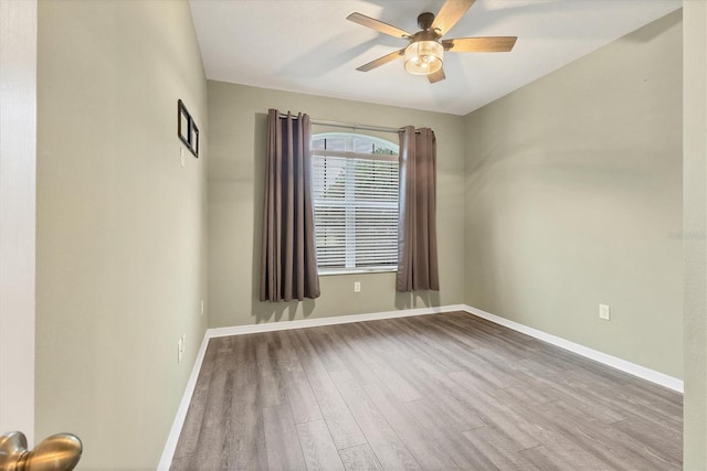 unfurnished room featuring ceiling fan and light hardwood / wood-style flooring