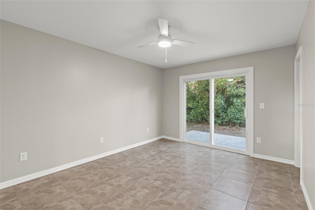 spare room with ceiling fan