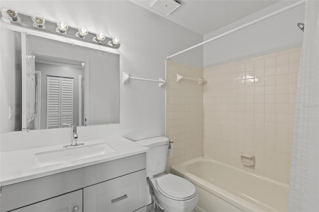 full bathroom with vanity, toilet, and shower / bath combo