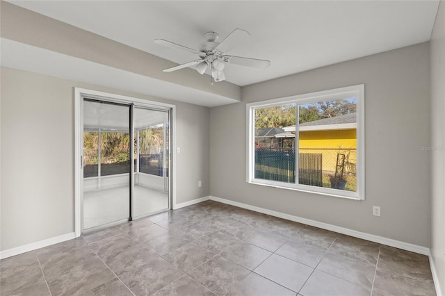 spare room featuring ceiling fan