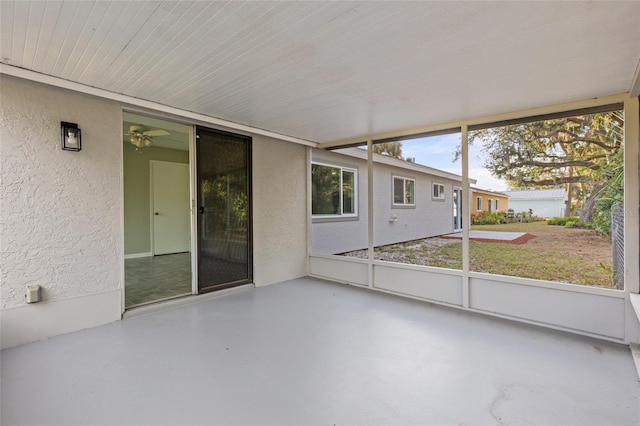 unfurnished sunroom featuring plenty of natural light