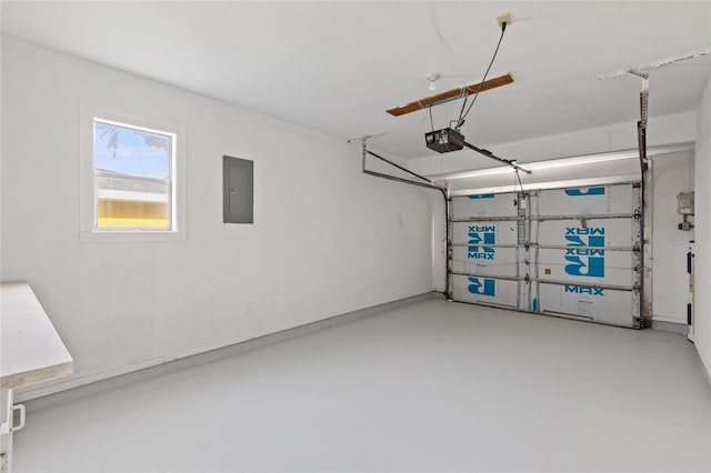 garage featuring electric panel and a garage door opener