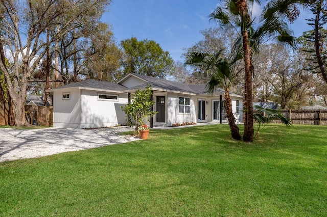 ranch-style house with a front yard