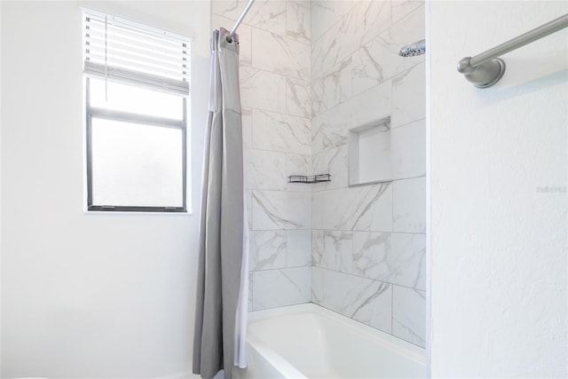 bathroom featuring shower / bath combo