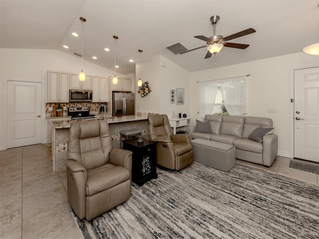 tiled living room with lofted ceiling, ceiling fan, and sink