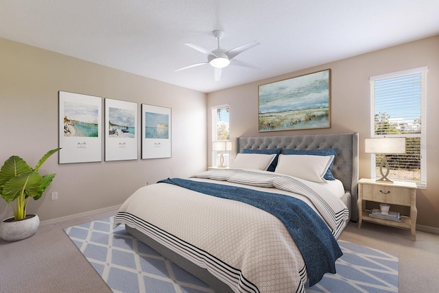 bedroom featuring carpet floors, baseboards, and a ceiling fan