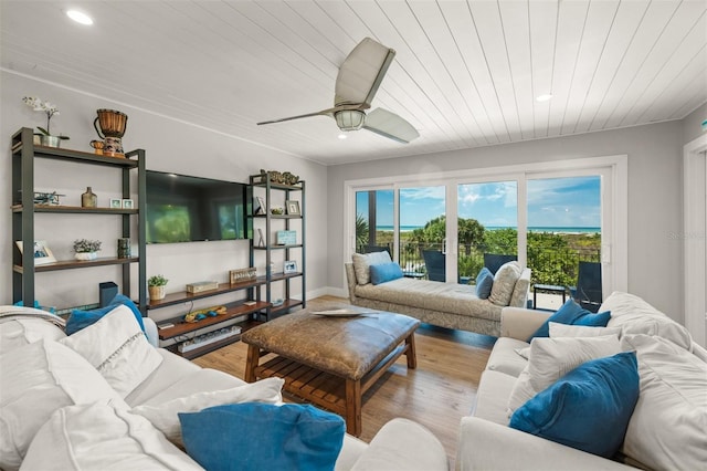 living room with wooden ceiling, light hardwood / wood-style flooring, and ceiling fan