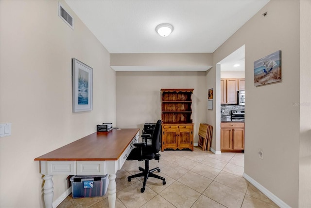 office space featuring light tile patterned floors