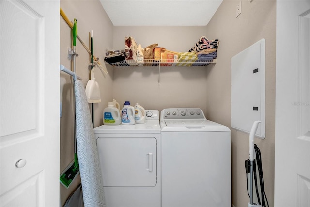 washroom featuring washer and dryer