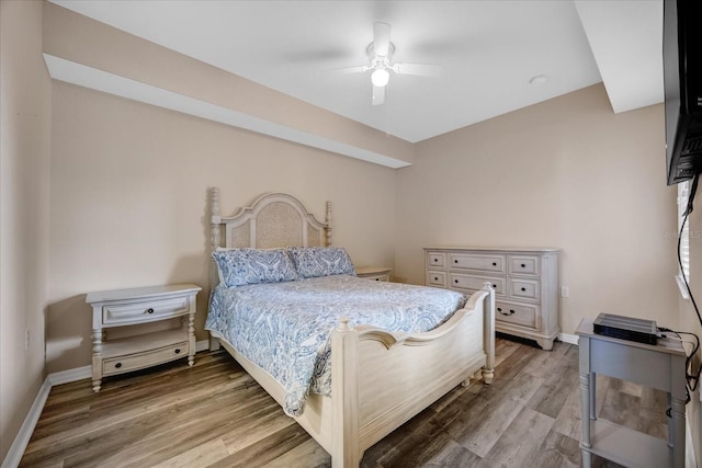 bedroom featuring ceiling fan and hardwood / wood-style floors