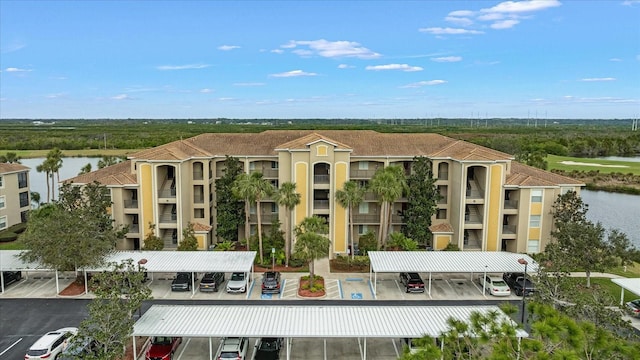 view of building exterior with a water view