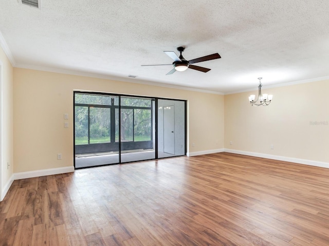 spare room featuring a textured ceiling, ceiling fan with notable chandelier, light hardwood / wood-style flooring, and crown molding