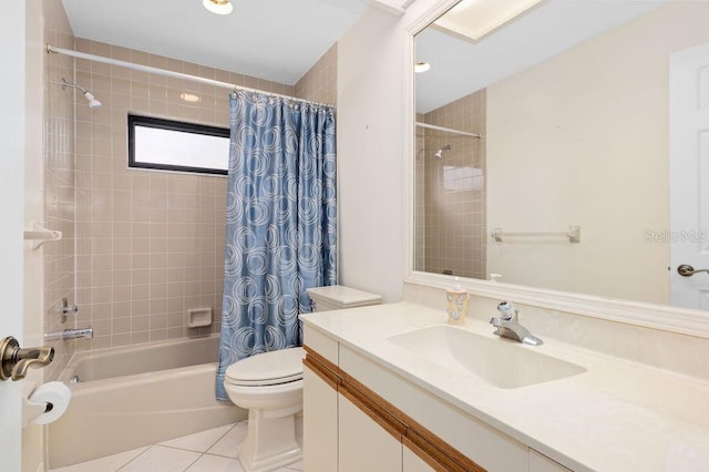 full bath with shower / tub combo with curtain, vanity, toilet, and tile patterned floors