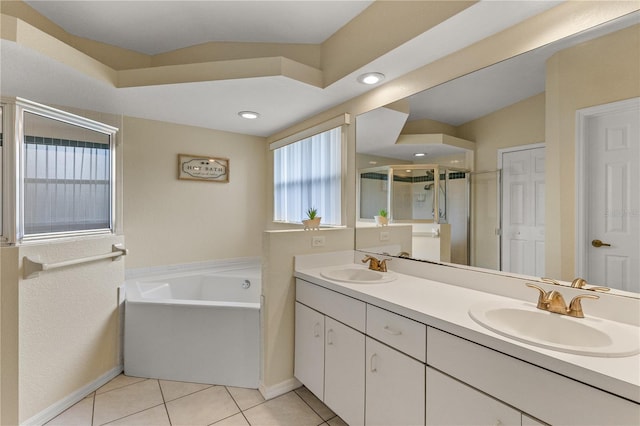 bathroom featuring tile patterned floors, plus walk in shower, vanity, and lofted ceiling