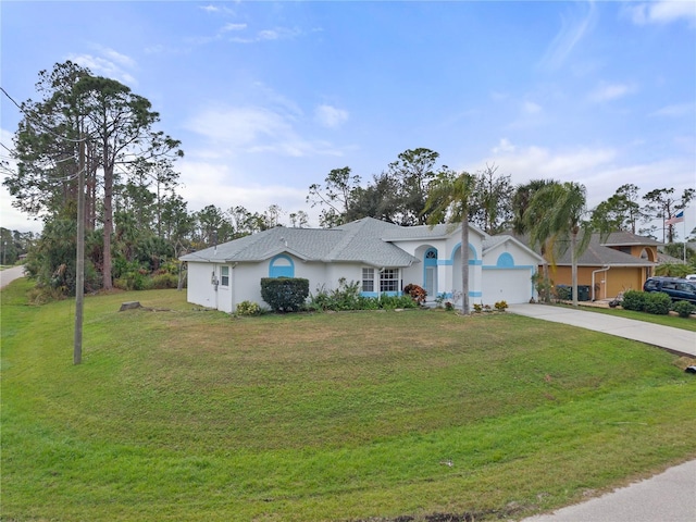 ranch-style home featuring a front yard and a garage