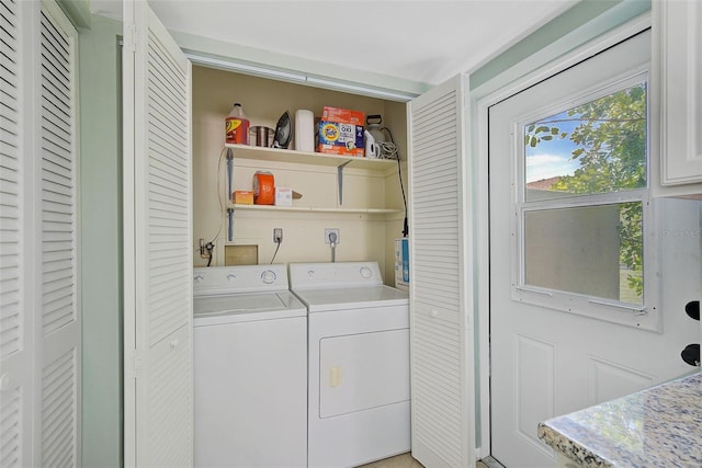 laundry area with independent washer and dryer