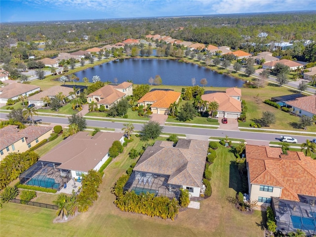 drone / aerial view with a water view