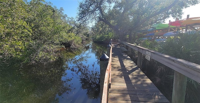 view of dock with a water view