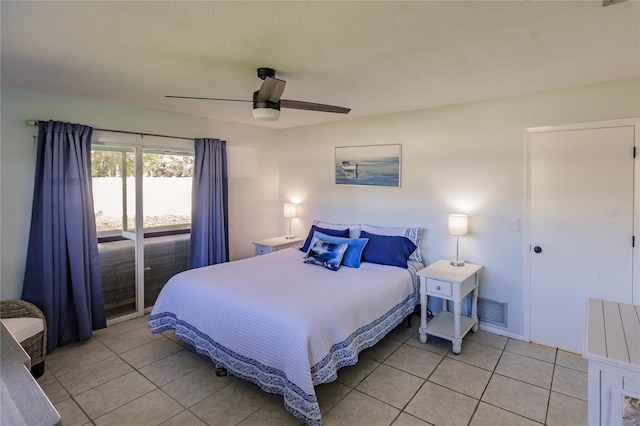 bedroom featuring ceiling fan and light tile patterned flooring