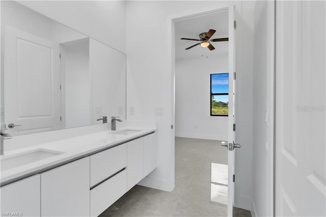 bathroom featuring vanity, tile patterned floors, and ceiling fan