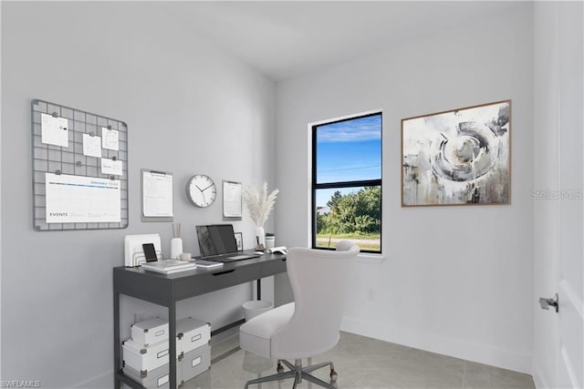 office space featuring light tile patterned flooring