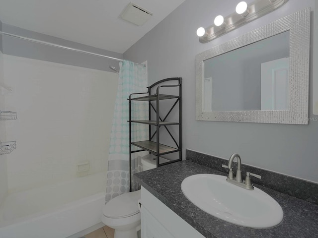 full bathroom featuring tile patterned floors, vanity, toilet, and shower / tub combo with curtain