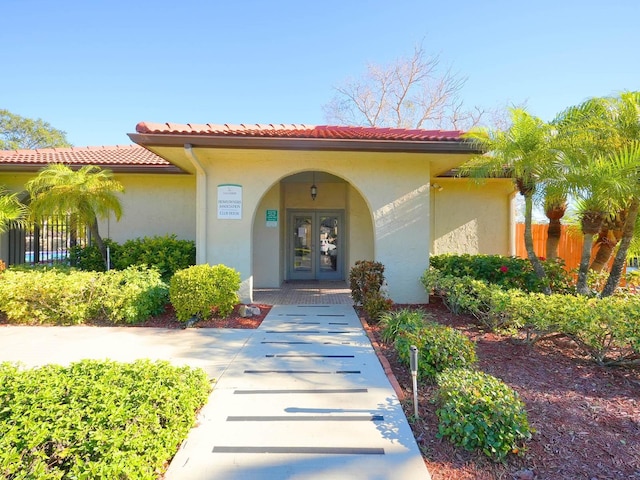 view of exterior entry with french doors