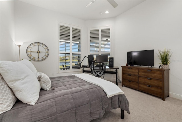 carpeted bedroom with ceiling fan